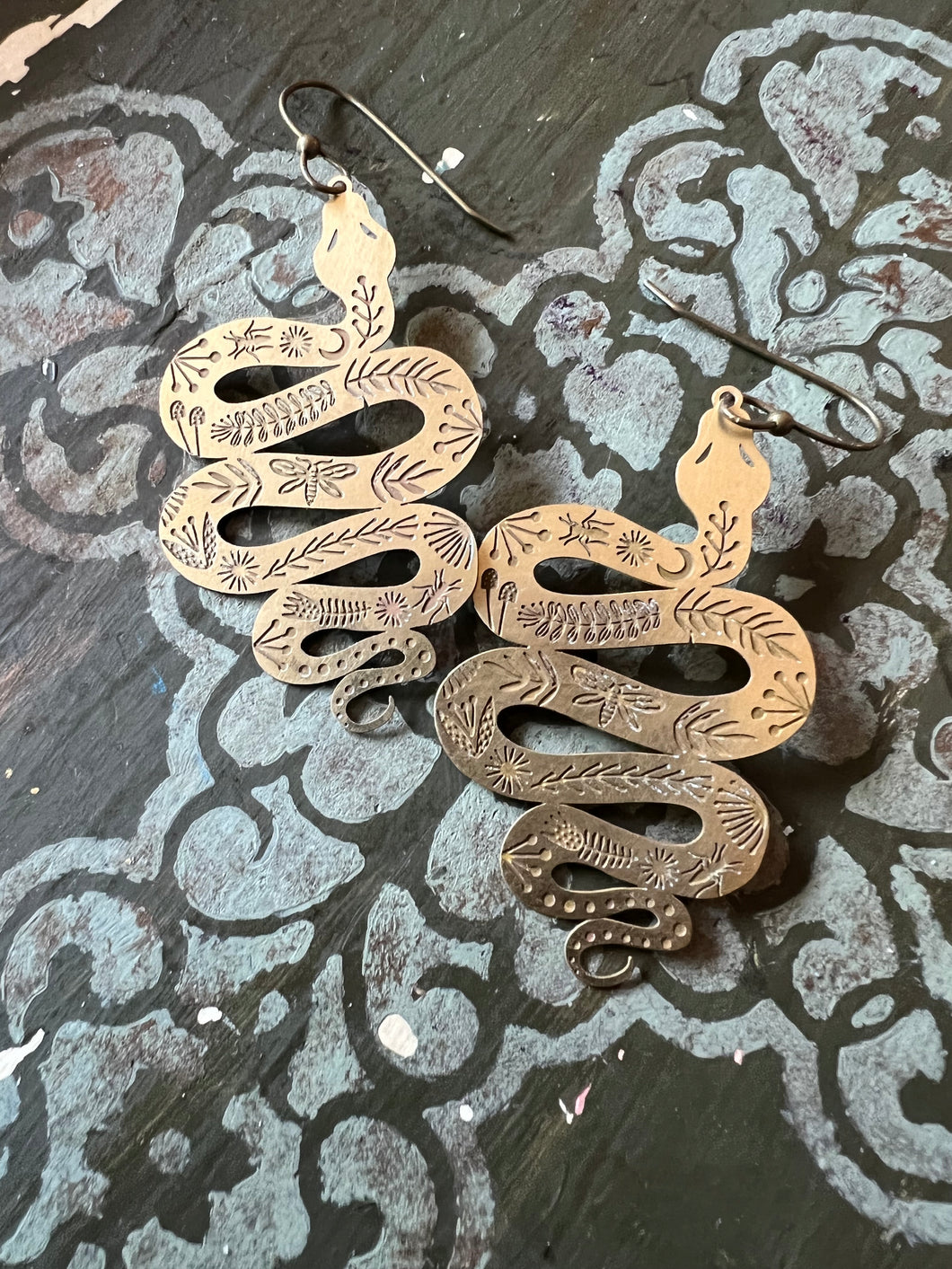 Brass celestial snake earrings