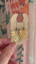 Load and play video in Gallery viewer, Hammered gold monstera leaf earrings
