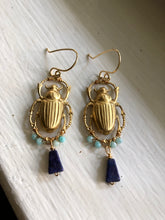 Load image into Gallery viewer, Golden scarab beetle with wire wrapped aventurine stones and lapis
