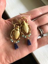 Load image into Gallery viewer, Golden scarab beetle with wire wrapped aventurine stones and lapis
