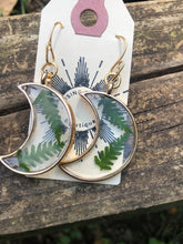 Load image into Gallery viewer, Resin earrings with dried ferns in a gold moon frame
