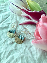 Load image into Gallery viewer, Brass stamped tulips and blue stone earrings
